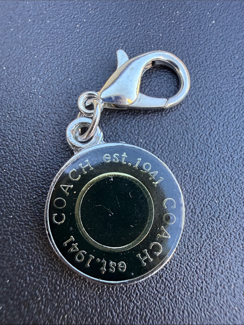 Coach Silver-Tone Round Phone Charm